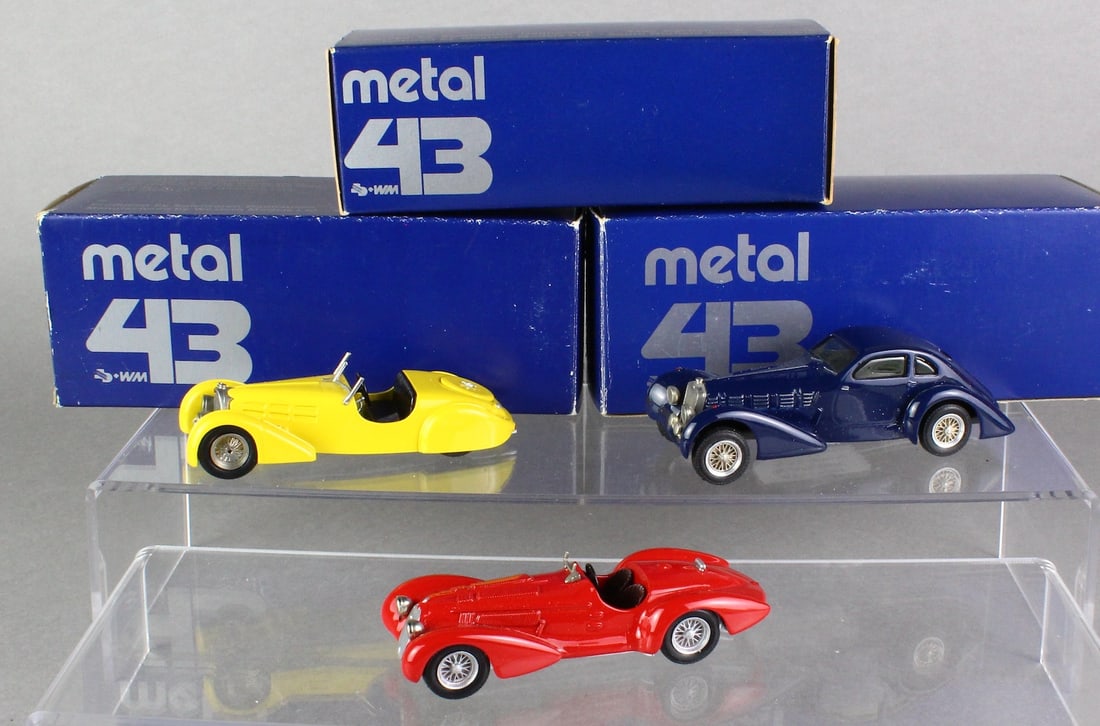 Metal 43 Cars in Box: Metal 43 Cars in Box. 2 Convertibles and sleek coupe.