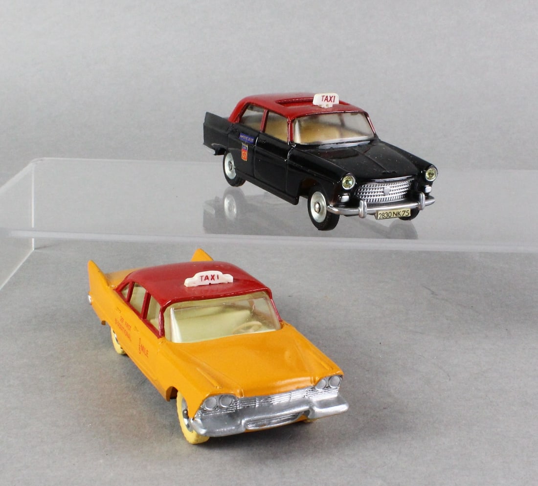 Dinky Taxi Cabs Plymouth & Peugeot (1 of 6)