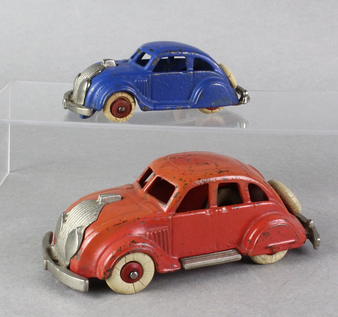 Hubley Cast Iron Airflow Cars: Hubley Cast Iron Airflow Rose color 6 inches and blue 4 1/2 inches.