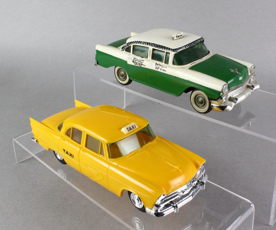 1950s Plymouth & Chevrolet Taxi Cab Promo Cars: 1950s Plymouth & Chevrolet Taxi Cab Promo Cars. Plymouth is by Jo-Han, Chevy has paint over embellishments.
