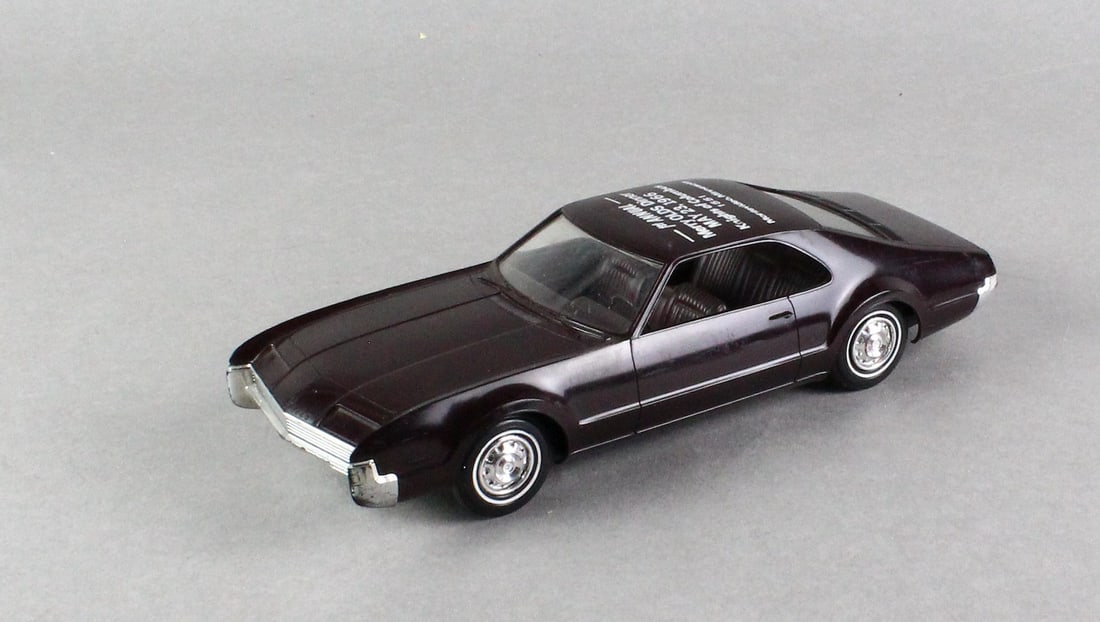 1966 Oldsmobile Promo Car Minnesota Advertising: Jo-Han Models 1966 Oldsmobile Toronado Dealer Promo Car with Advertising for Merry Olds Dinner, Minnesota Oldsmobile.