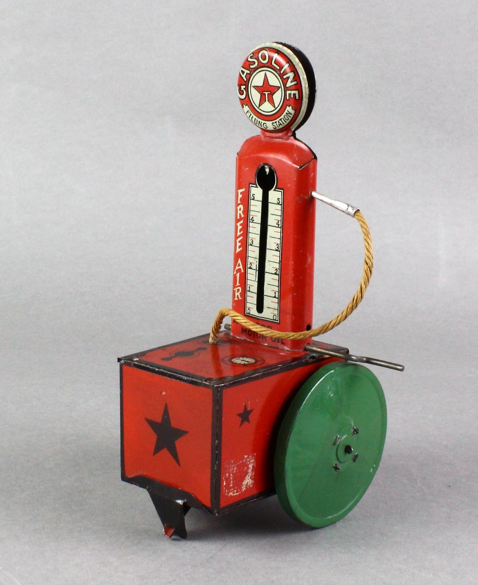 1920s Texaco Tin Mobile Filling Station Gas Pump: 1920s Texaco Tin Mobile Filling Station Gas Pump. 8 inches tall.