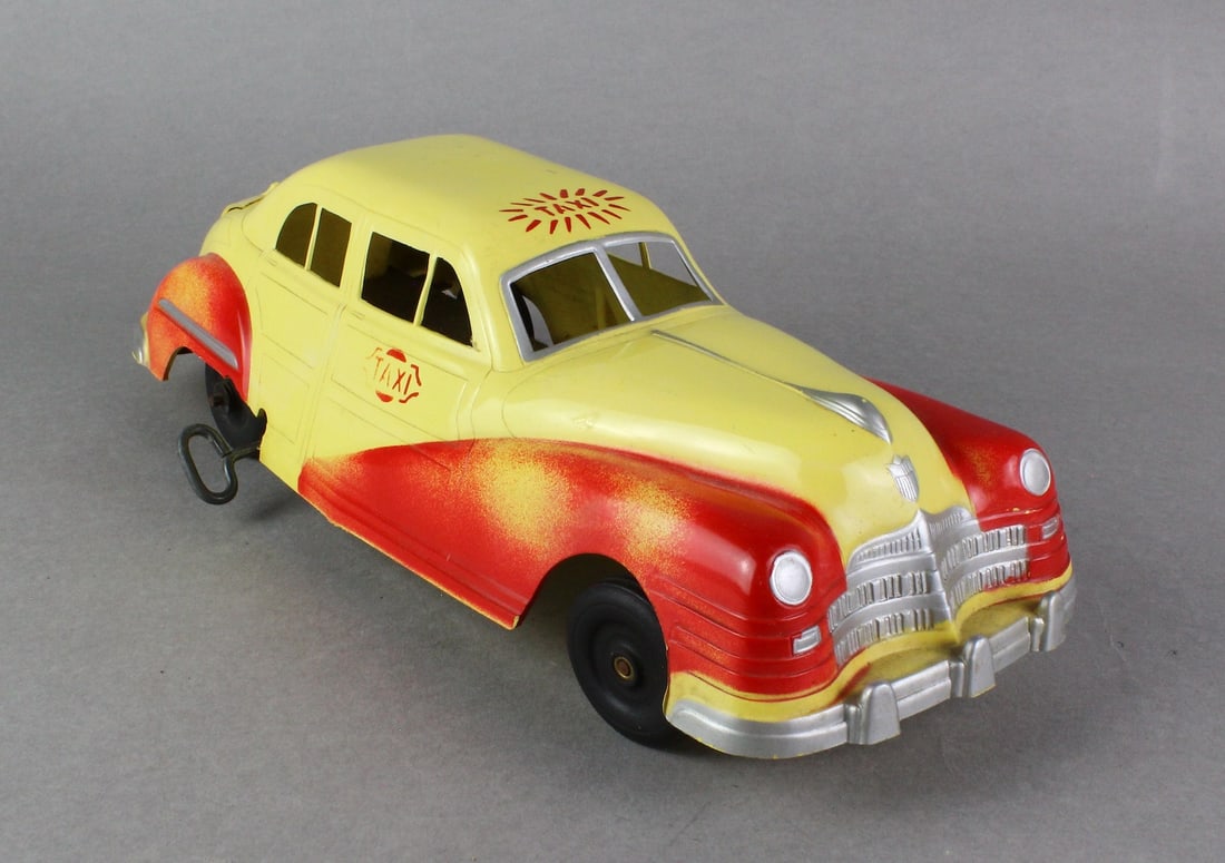 1940s Irwin Chrysler Taxi Cab Wind Up Large: 1940s Irwin Chrysler Taxi Cab Wind Up, 13 inches.