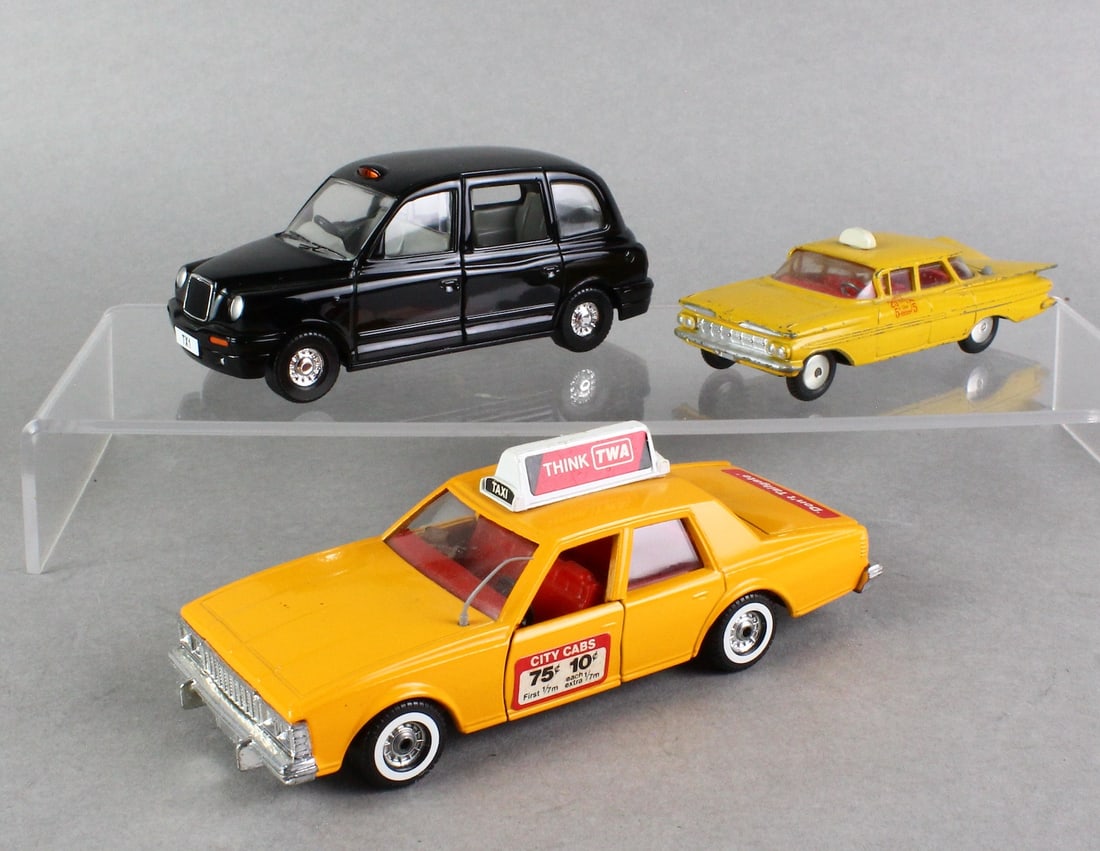 Corgi Chevrolet Impala Taxi, & 2 Corgi Taxi Cabs: Corgi Chevrolet Impala Taxi #221, Caprice Classic Taxi Cab #327, and British Taxi.
