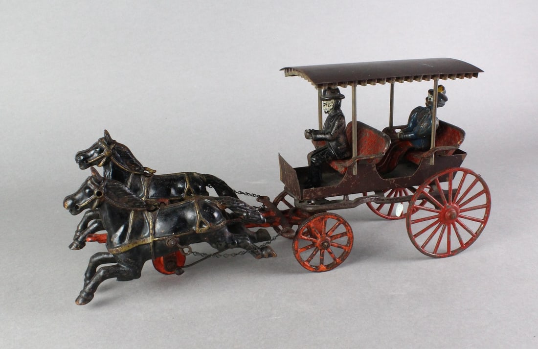 Hubley Cast Iron Surrey & Passengers: Cast Iron Surrey & Passengers. Early with tin roof. 14 inches long.