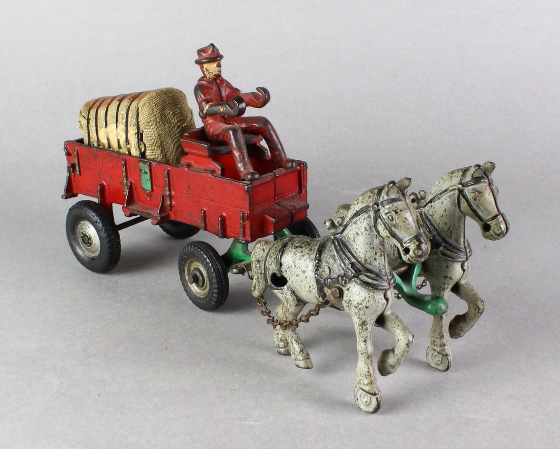 Arcade Draft Horse Driven Wagon: Arcade Draft Horse Driven Wagon, 11 inches long.