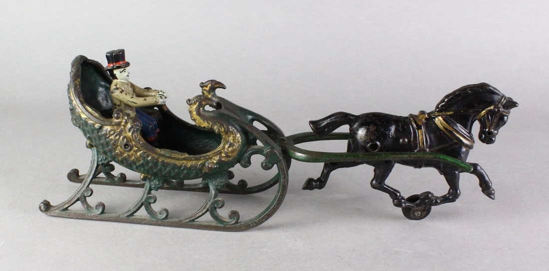 Hubley Cast Iron One Horse Sleigh: Hubley Cast Iron One Horse Sleigh with top hat driver. 15 inches long.