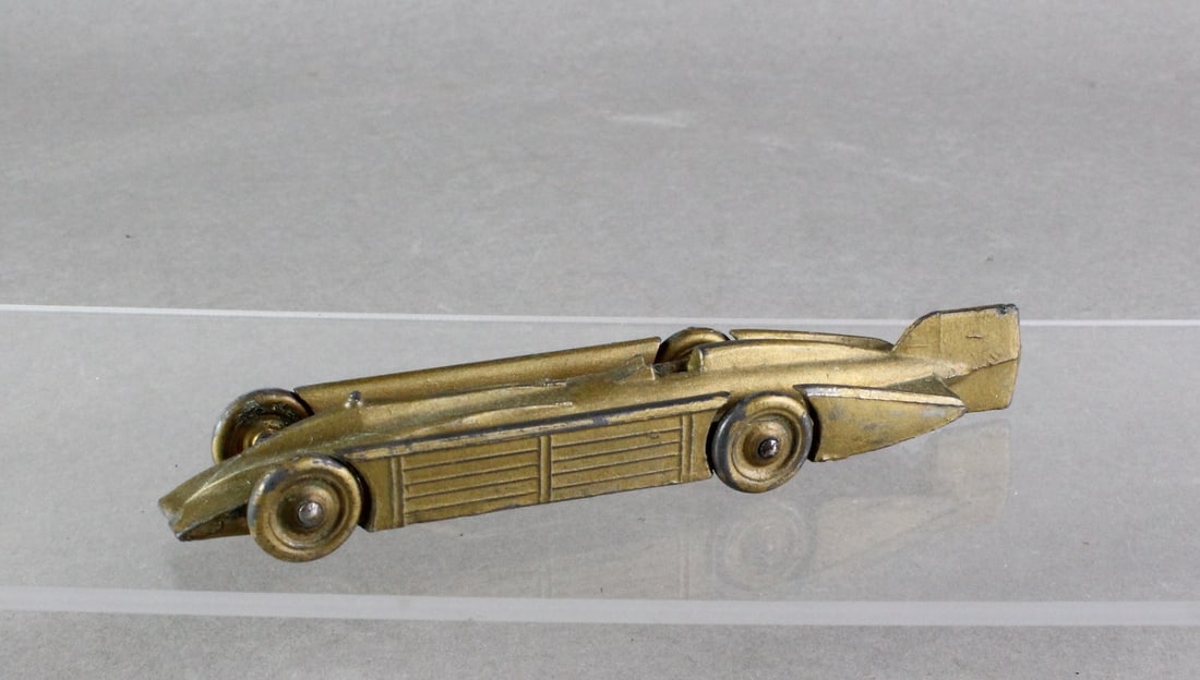 1929 Rare Golden Arrow Race Car: 1929 Rare Gold Arrow Race Car. Scarce Mini Model Golden Arrow Speed Record Model Race Car, Made In England, Copyright Under License From SIR HENRY SEGRAVE, Holder World's Speed Record 231 M.P.H. At Da