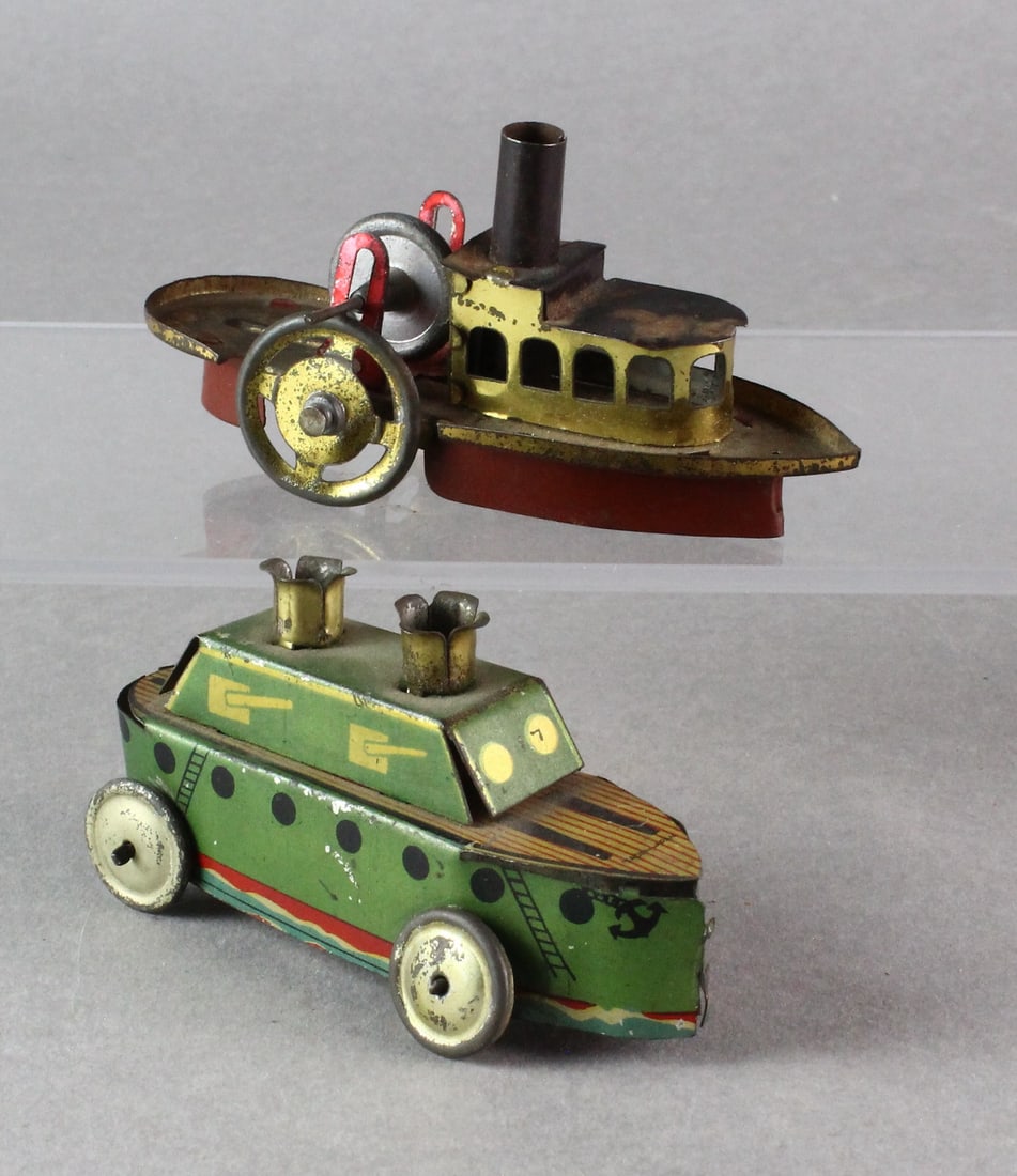 German & Japan Penny Toy Ships & Goose: German Tin Penny Toy Steam Ship & Platform Goose. Japan Tin Pre-War battelship penny toy. Longest 5 1/2 inches.