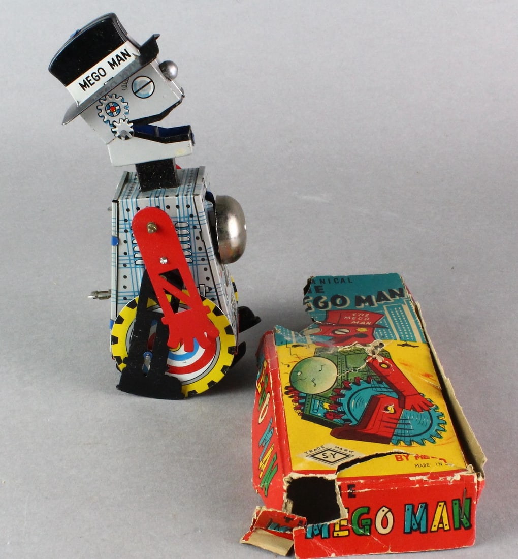 SY Japan Tin Mego Man & Partial Box: SY Japan Tin Mego Man & Partial Box. Nice graphic working Robot, partial box top.