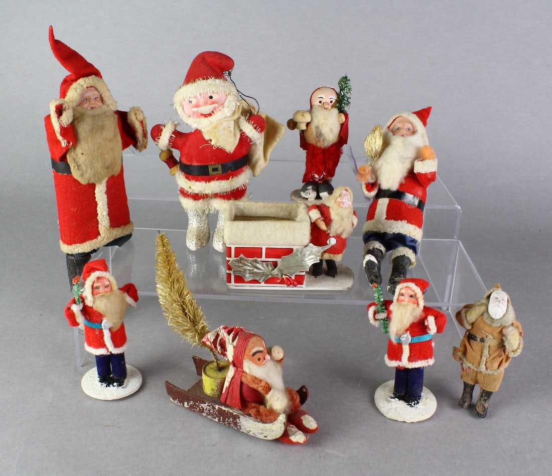 Santa Figures Germany, France & Japan: Nine Vintage Santa Claus figures from France, Germany, and Japan. French paper Mache, others paper and composition, tallest 10 inches and missing one leg. Festive group!