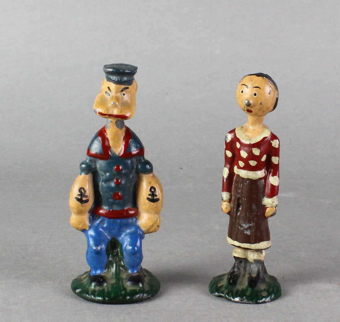Popeye & Olive Oyl Comic Character Figures: Popeye & Olive Oyl Figures. 1920s Lead Paperweight comic figures, original paint, 4 1/4 inches tall.