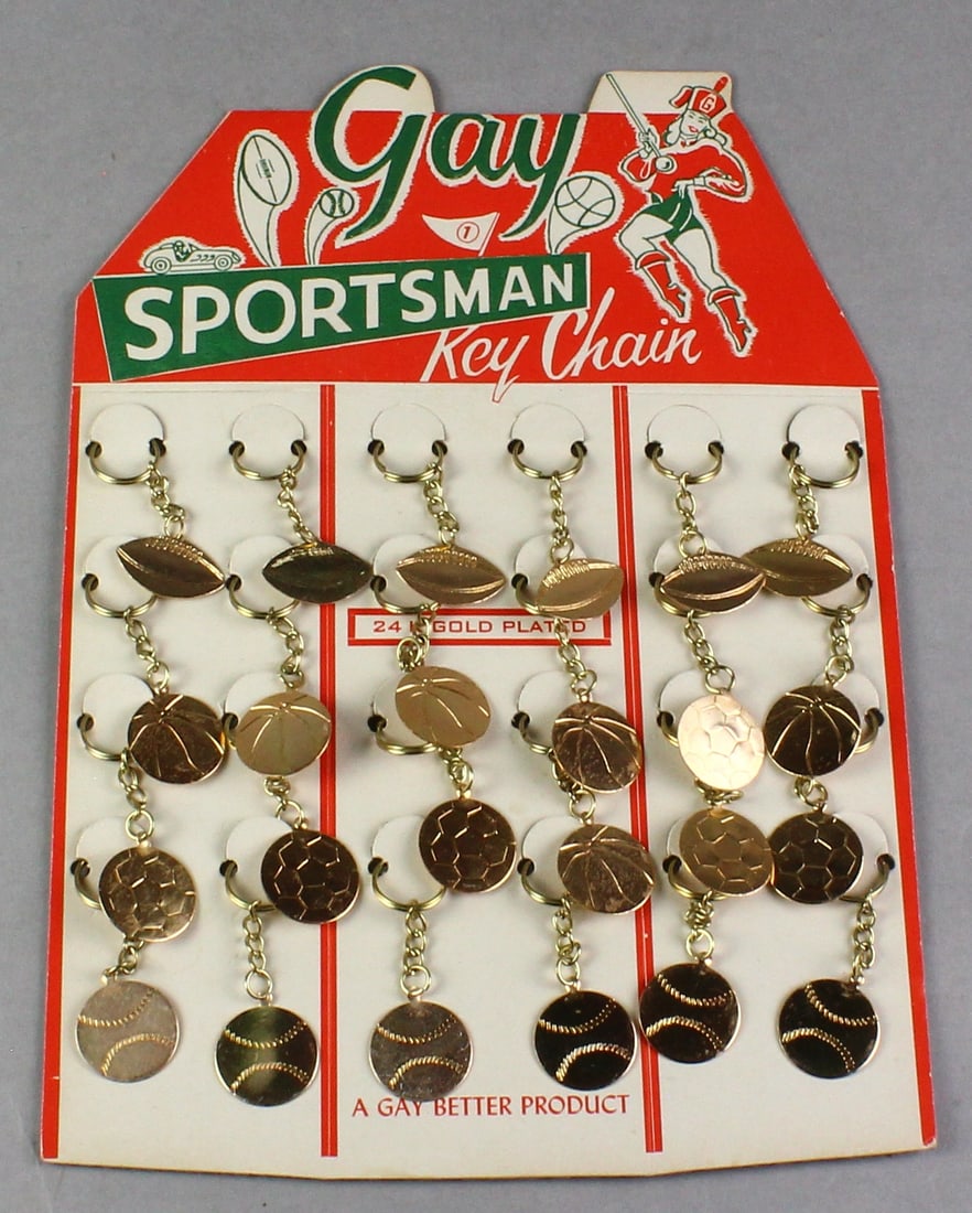 Dime Store Display Gay Sportsman Key Chain: 1950s Store Display "Gay Sportsman Key Chain". 24 K Gold Plated Key Chains of Football, Soccer, Baseball, Basketball. Complete set! Never used store sale item.