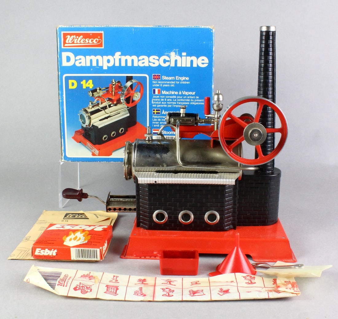 Wilesco German Steam Engine in Box: Wilesco German Steam Engine in Box. Appears to have been fired up once otherwise near mint. All accessories there including fuel. c.1960s West Germany.