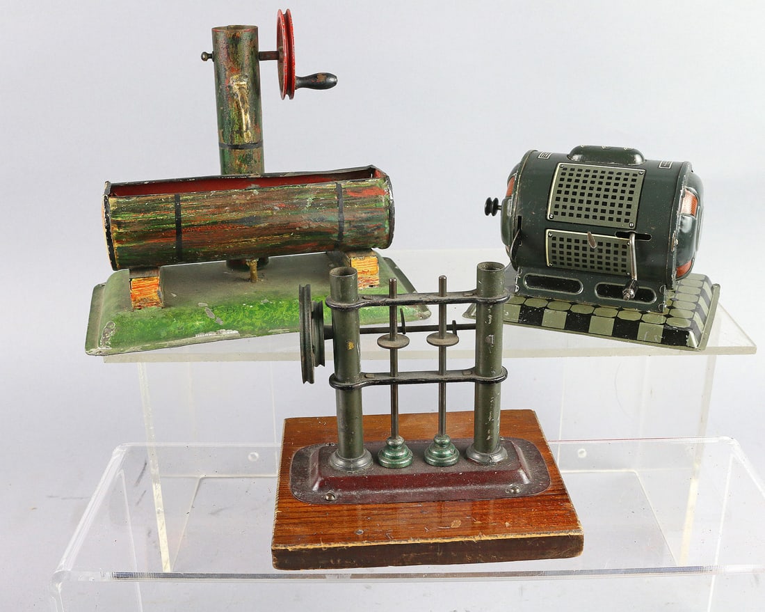 German Tin Water Pump & Hess Dynamo: Bing or Doll et Cie. German Tin Water Pump & Hess Dynamo Lot, 3. 5, 5, 7 inches.