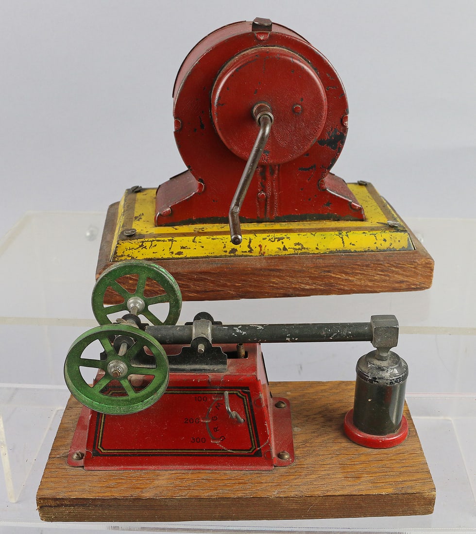 German Tin Dynamos to Drive Steam Toys: German Tin Dynamos to Drive Steam Toys. Hess and large Dynamo Lot. 7 inches longest.