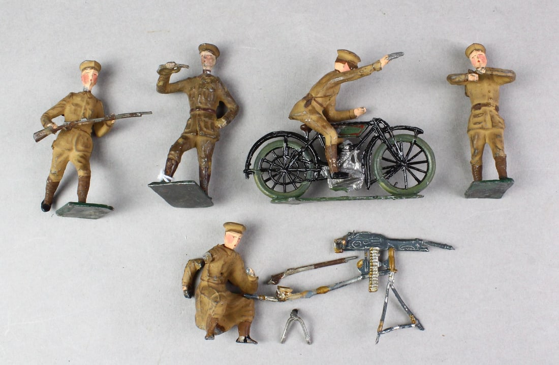 France Made Britains with Motorcycle: France Made Britains with Motorcycle. Some loose pieces as shown.