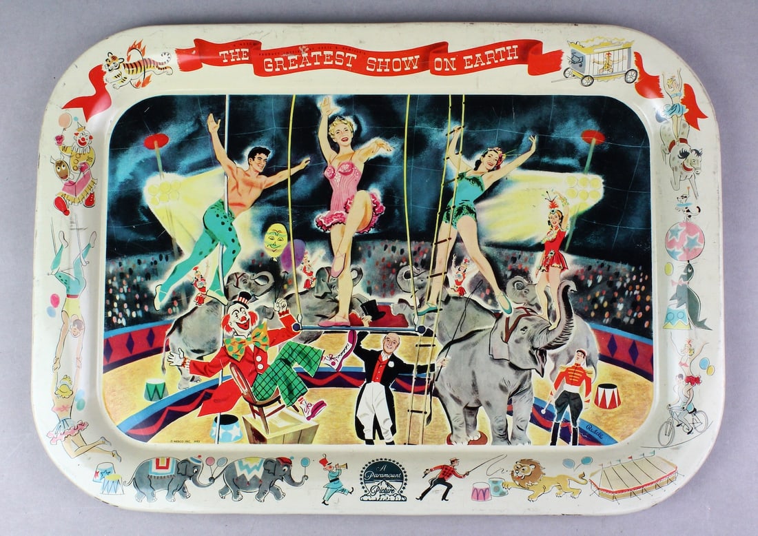 1952 Paramount Pictures- Greatest Show on Earth Ad Tray: The Greatest Show on Earth Serving tray- A Paramount Picture. Paramount Souvenir made by Nesco 1952. 18 inches wide. American film produced and directed by Cecil B. DeMille, in Technicolor. The Ringli