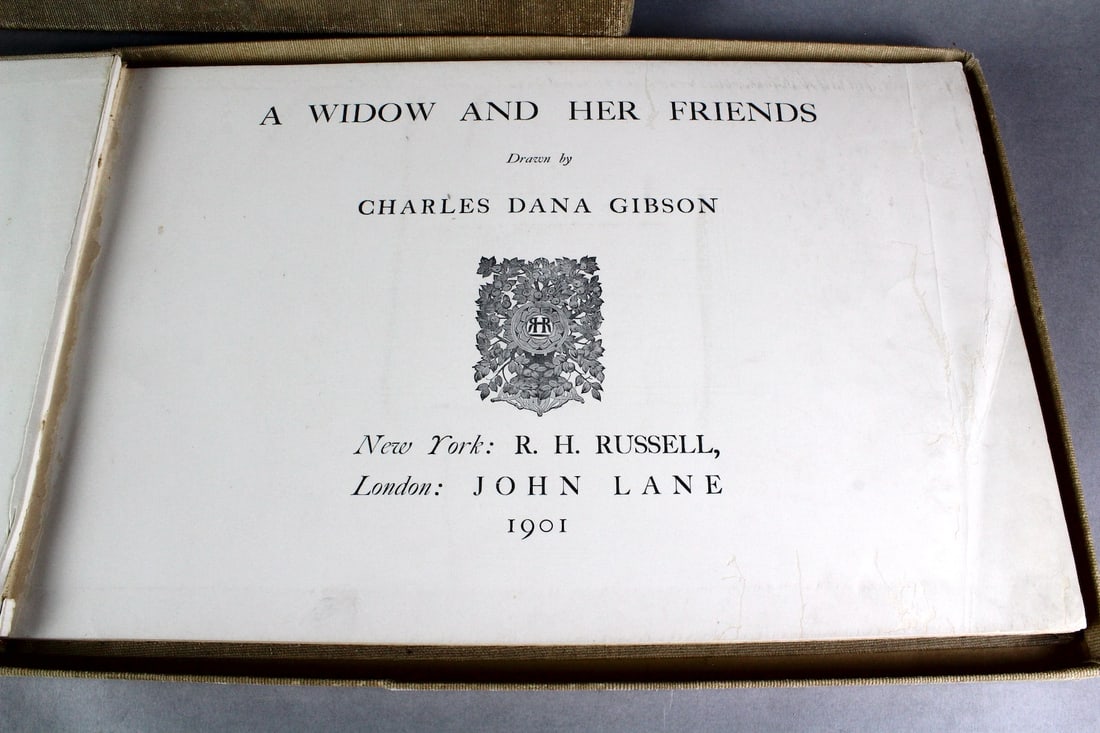 Signed Charles Dana Gibson Book of Illustrations: Signed Charles Dana Gibson Book of Illustrations- "A Widow and Her Friends". 1901 #102 of 250. 76 of illustrations with signature on heavy stock. Book in case. Famous "Gibson Girl" artist of the turn