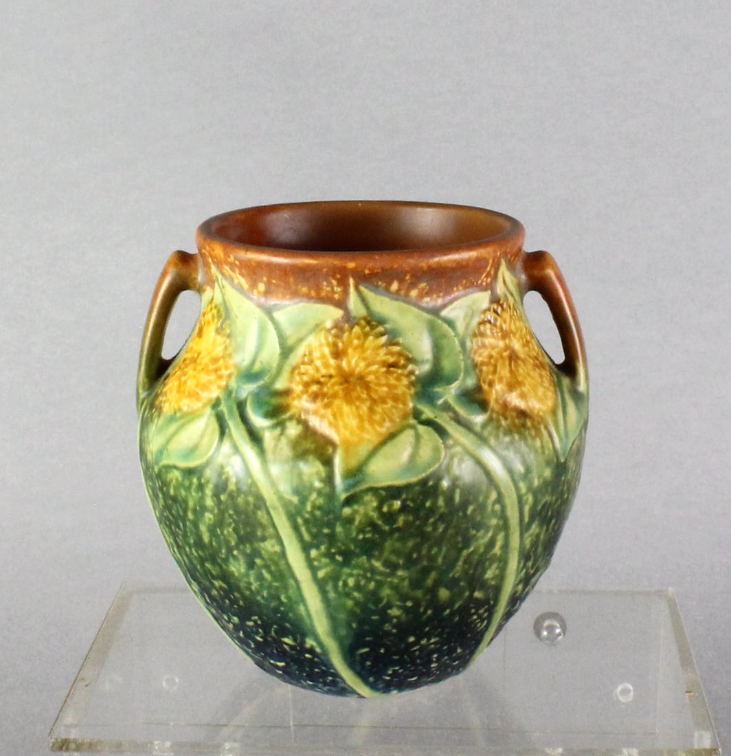 Roseville Sunflower Vase Art Pottery: Roseville Sunflower Vase. 5 1/2 inches tall. Crisp molding and color.