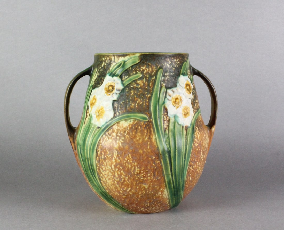 Roseville Pottery Jonquil Handled Vase: Roseville Pottery Jonquil Vase. Tall 10 1/4 inches.