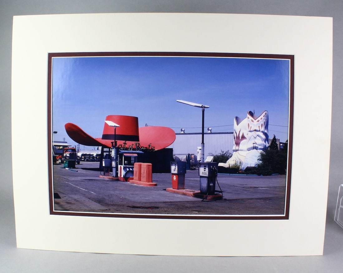 John Margolies Roadside America Hat N' Boots Color Original Print: John Margolies Author of Roadside America Original Large Format Kodak Color Photograph from the artist. Hat N' Boots Gas station Landmark in the Georgetown neighborhood of Seattle, Washington. It was