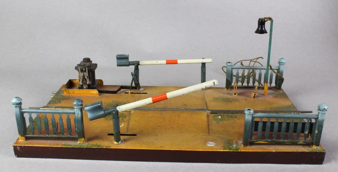 Marklin 2 Gate Train Crossing: Marklin German Tin 2 Gate Train Crossing, 14 inches wide. Missing some parts, as shown.