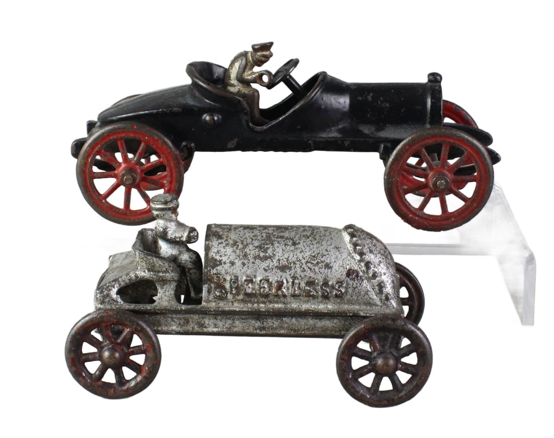Kenton Peerless & Williams Cast Iron Race Cars: Early Cast Iron Race Cars with drivers. Williams, early boat tail racer 7 3/4 inches and Kenton Peerless Racer with driver. Good looking early racers.