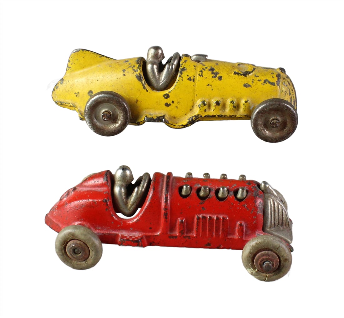 Hubley Cast Iron Boat Tail Racers with Drivers: Hubley Cast Iron Boat Tail Racers with Drivers. Good looking Hubley 5 inch race cars with drivers, exposed pistons.