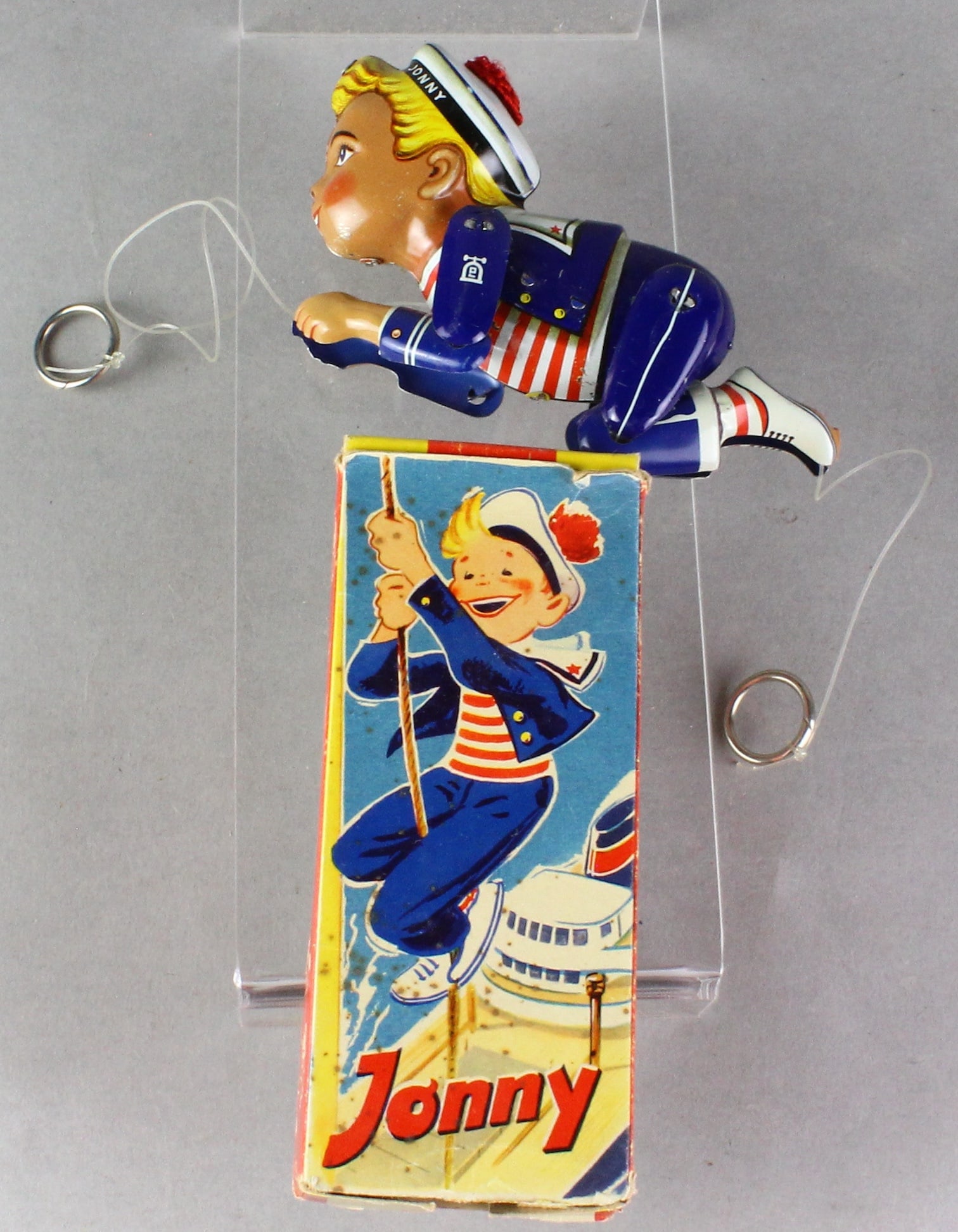 Lehmann Tin Jonny Climbing Sailor in Box: Lehmann Tin Jonny Climbing Sailor in Box. 6 1/2 inches long.