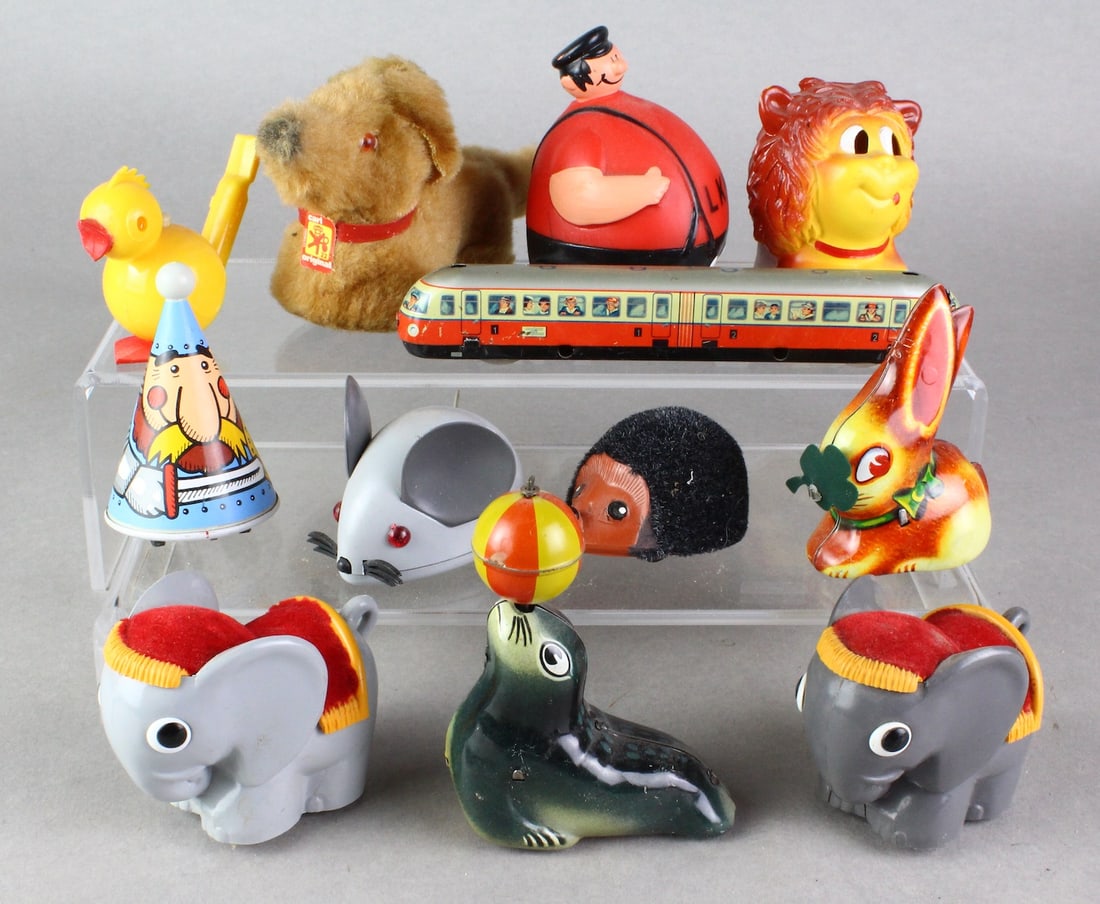 Lehnmann Toy Wind Up Lot: Lehnmann Toy lot of 13 toys. Tin and plastic wind ups including Train track toy.