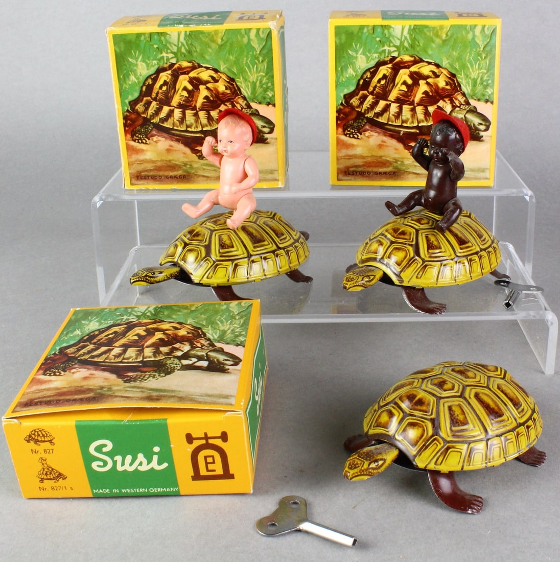 Lehmann Susi Turtle with Baby Rider in Box x 3: Lehmann Susi Turtle with Baby Rider in Box x 3. 3 Lehmann wind up turtles in box. 2 come with baby riders.