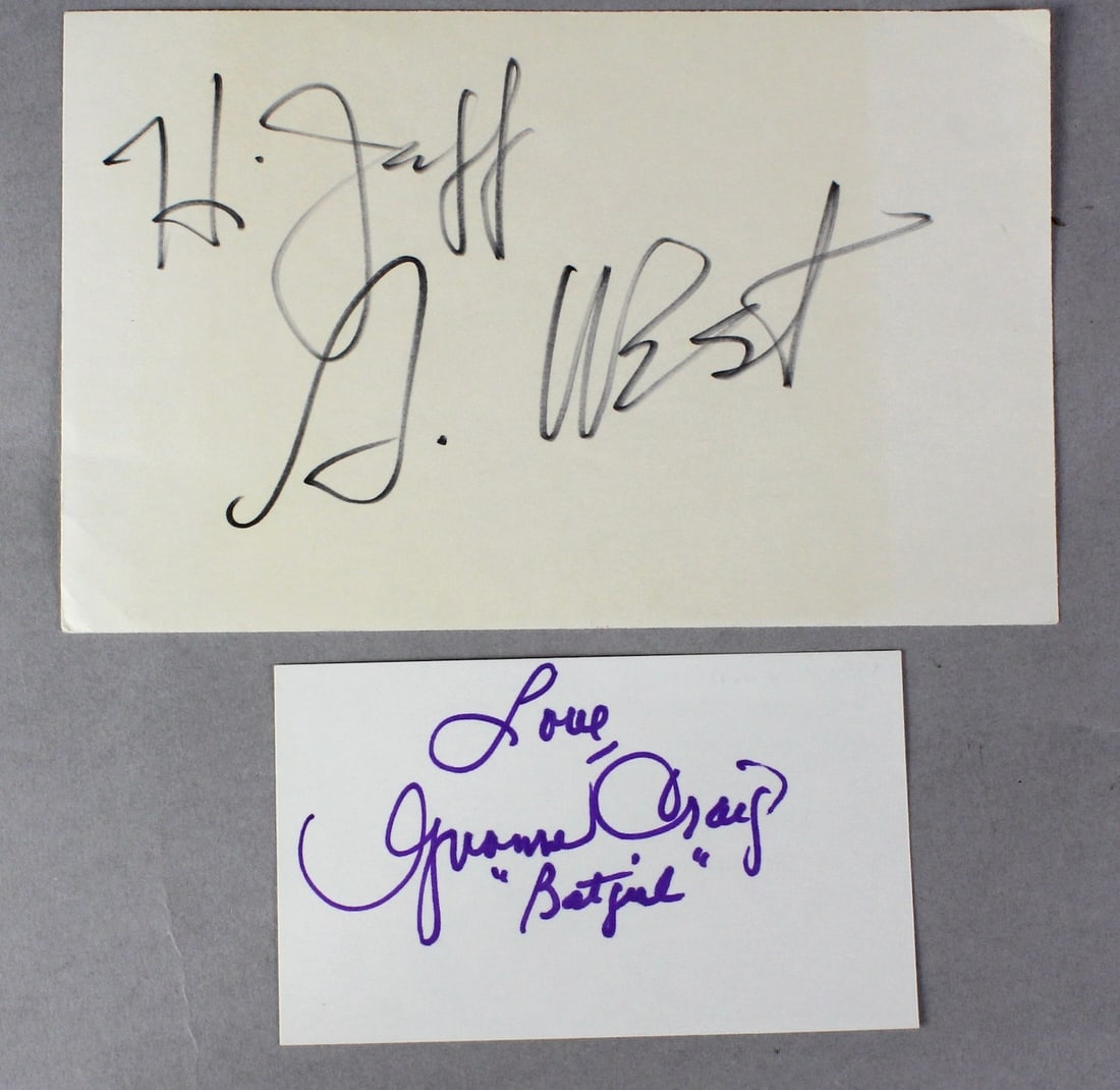 Signed Adam West Batman & Yvonne Craig BatGirl: Signed Adam West Batman & Yvonne Craig Batgirl. Signatures on card of the 1960s Batman TV heroes.