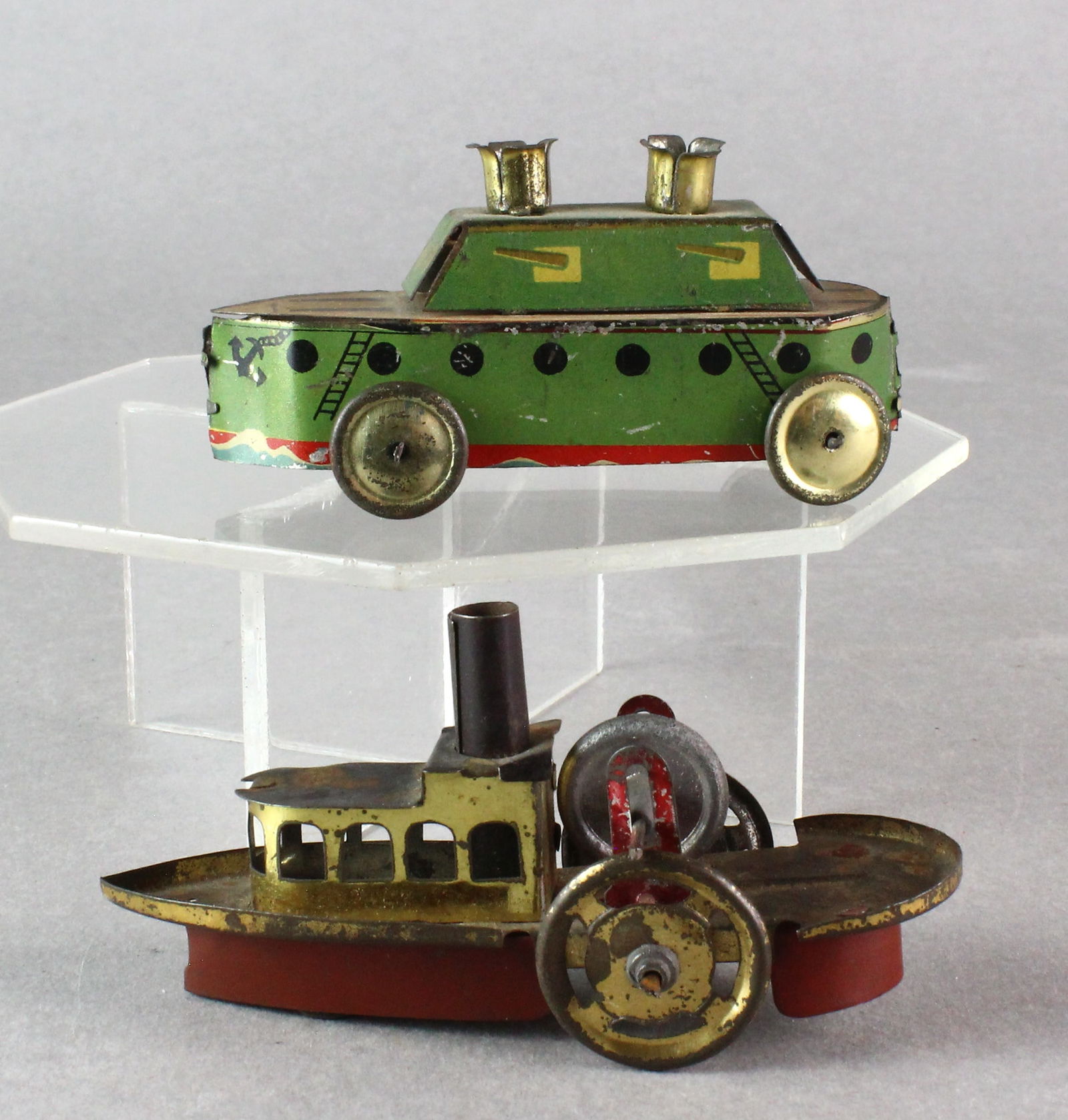 German & Japan Tin Penny Toy Ships & Goose: German Tin Penny Toy Steam Ship & Platform Goose. Japan Tin Pre-War battelship penny toy. Longest 5 1/2 inches. About 115 years old.