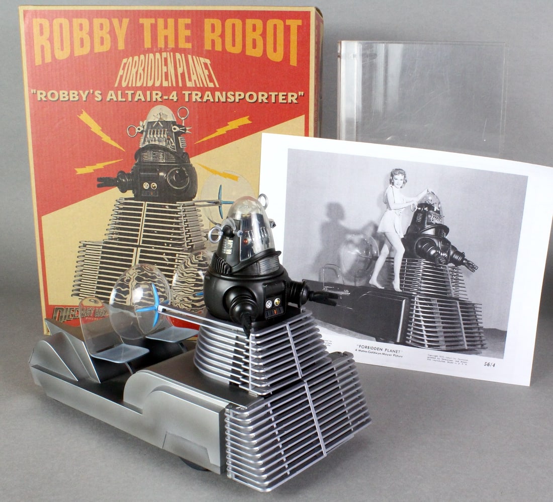 Robby the Robot Forbidden Planet Altair-4 Transporter: Robby the Robot Forbidden Planet in Box Robby's Altair-4 Transporter. High quality contemporary issue. Original crisp box marked "X+ Turner Entertainment Company". Diecast Robby figure inside
