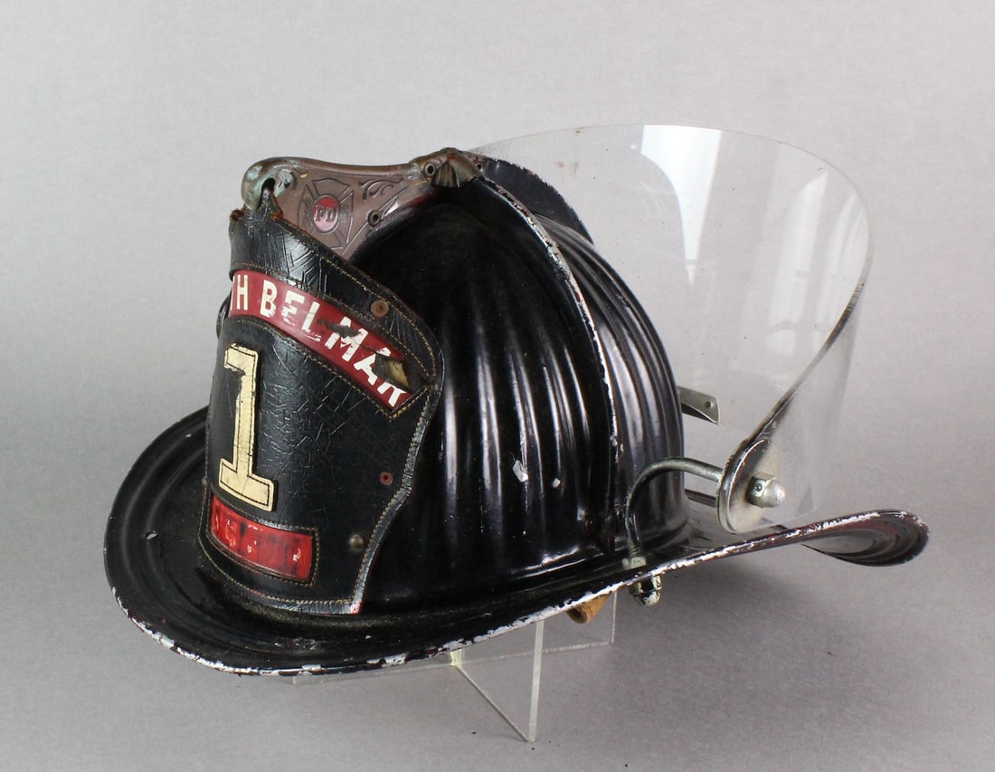 South Belmar #1 FD Fire Helmet: South Belmar #1 FD Fire Helmet. Aluminum Helmet with Plectron Shield. Leather helmet front piece.