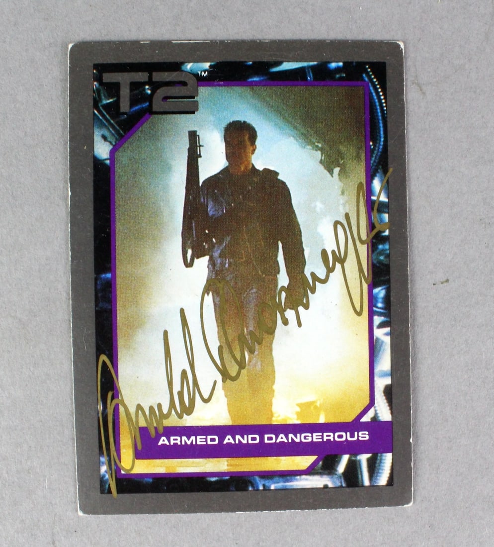 Signed Terminator Card Arnold Schwarzenegger: Signed Terminator Card Arnold Schwarzenegger. Strong gold pen signed front on the Armed and Dangerous card.