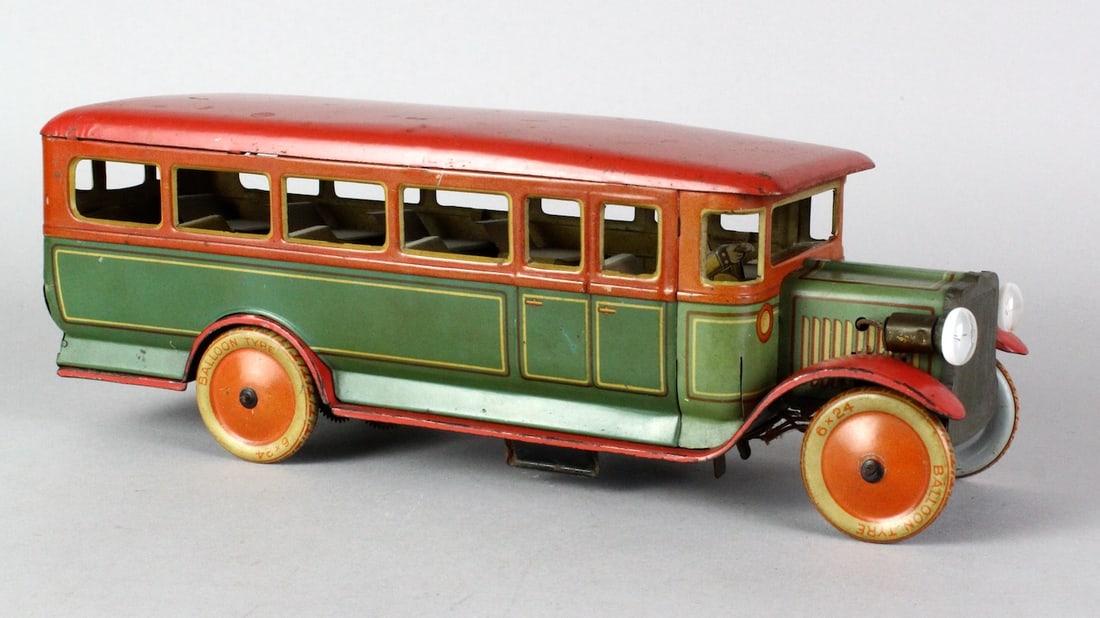 Large German Tin Bus w/ Headlights TippCo: Large German Tin Bus w/ Headlights. Rare excellent working wind up just under 12 inches long. Possibly TippCo.