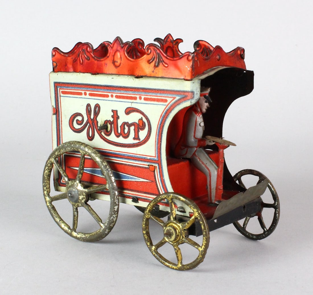 c.1902 German Tin Auto Reil & Co. Motor Car: c.1902 German Tin Reil & Co. Motor Car. Early car using the tin from the Reil horse drawn wagons, transitioned to the new "Motor" automobile. Beautiful litho in outstanding condition. Scarce auto is 5