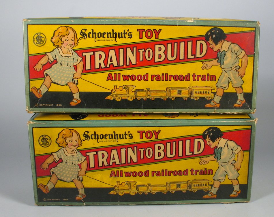 Pair of Schoenhut Train Builder Sets in the Box: Pair of Schoenhut Train Builder Sets in the Box. Wooden trains unbuilt in the colorful box.