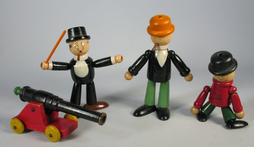 1930s Jiggs, Moon Mullins and Kato Wood Figures: Wood jointed figures and wooden cannon. King Features Syndicate George McManus Cartoon Characters. Figures 5-6 inches tall.