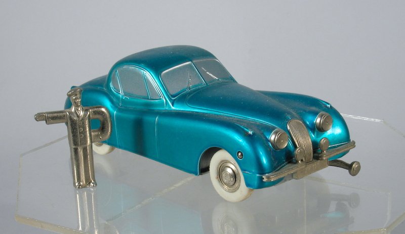 Prameta German Mechanical Jaguar & Key: Scarce Blue Prameta German Mechanical Jaguar wind up with original key. Measures 5 1/2 inches long.