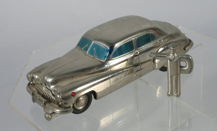 Prameta German Wind Up Buick & Key: Prameta German Mechanical Buick wind up with original Figural key. Measures 5 1/2 inches long.