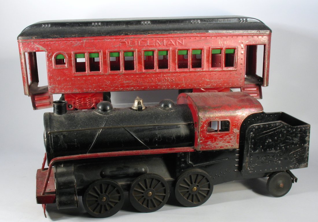 Cor Cor Pressed Steel Locomotive and Pullman Coach: Cor Cor Pressed Steel Locomotive and Pullman Coach. Large train toy measures 24 inches long.