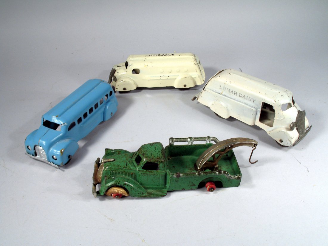 Wyandotte / Hubley Cast Iron Lot: Wyandotte / Hubley Cast Iron Lot, 3 Deco Wyandotte trucks and 1 Hubley Cast Tow truck