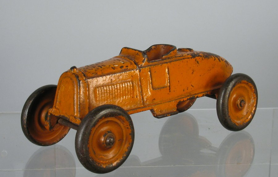 Kenton Large Race Car: Kenton Cast Iron boat tail racer. Measures 7 inches long.