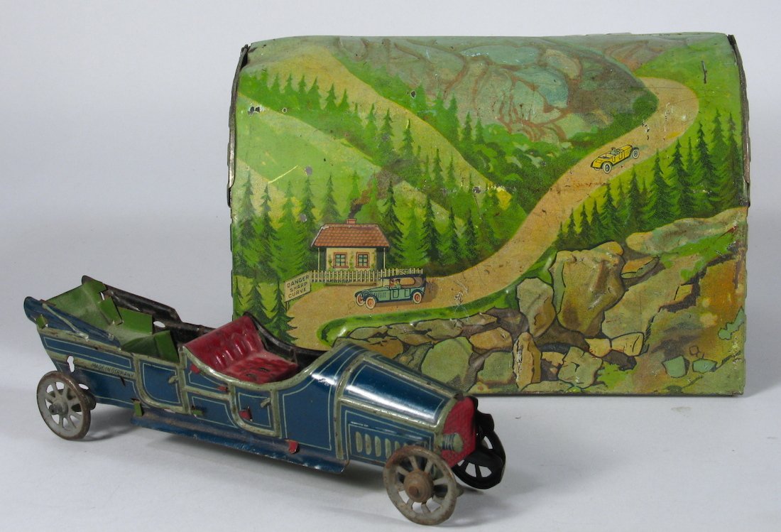 Distler/Fischer German Tin Limousine & Tunnel: 1920s Distler/Fischer German Tin Limousine & Tunnel w/Bavarian Cars & Mountains. German limousine is 7 inches long, Tunnel is 7 1/2 inches long.