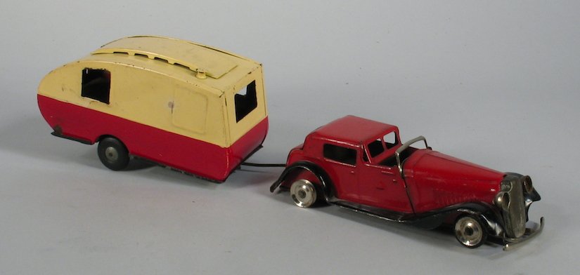 Minic Tri-Ang Limousine and Caravan Travel Trailer: 1930s Minic Vauxhall cabriolet and16M Caravan. Hard to find 1930s tin Caravan trailer and Town Car sedan. Car has a loose tire. Made in England.