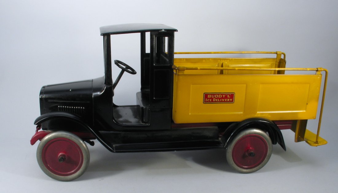 1920s Buddy L Ice Truck: Buddy L Pressed Steel Ice Truck with ice and tongs. Outstanding example. Measures 28 inches long. Possibly paint retouching in past, age indeterminate, excellent overall appearance.