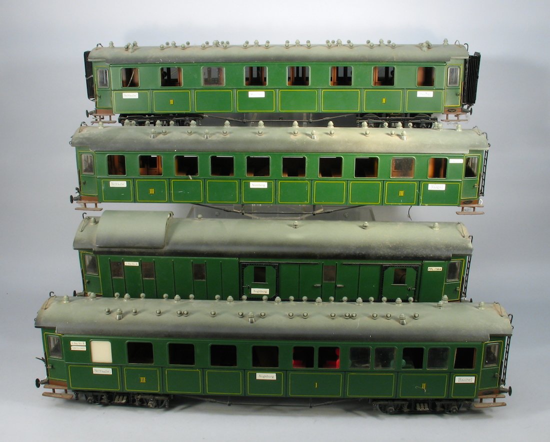Wilag Tin Passenger Train Cars- 4: Four German passenger coaches and baggage car by Wilag of Switzerland. These are the high end tinplate train replicas of the original 1920s Marklin cars. (Plastic windows are included in the cars need